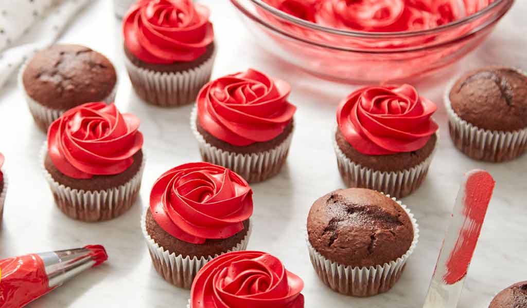 chocolate cupcakes with red buttercream frosting