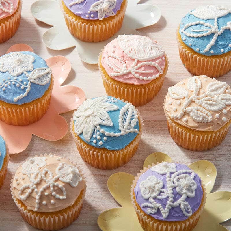 Embroidered-Cupcakes Spring cupcakes with piped flowers that look like embroidery
