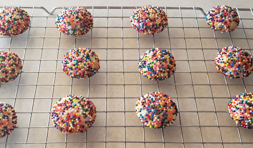 Sugar Cookie Step 10- Finished Cookies making sugar cookies step 10 finished sugar cookies on baking sheet