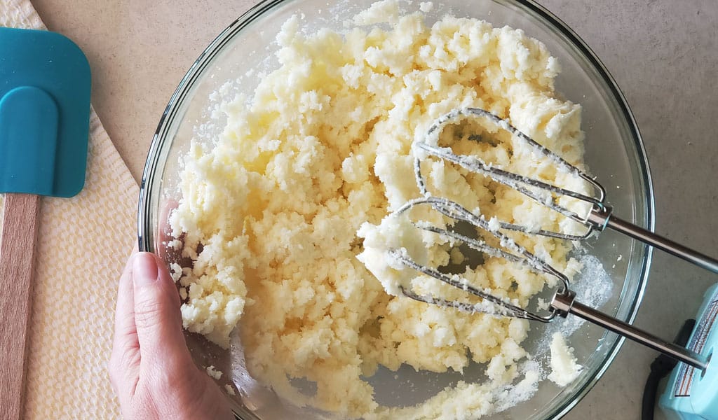 Sugar Cookie Step 2- Light and fluffy making sugar cookies step 2 showing that mixture should be light and fluffy