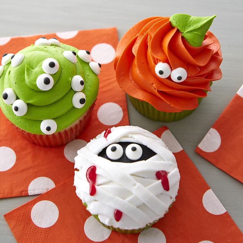 Assorted Halloween cupcakes using candy eyeballs to decorate