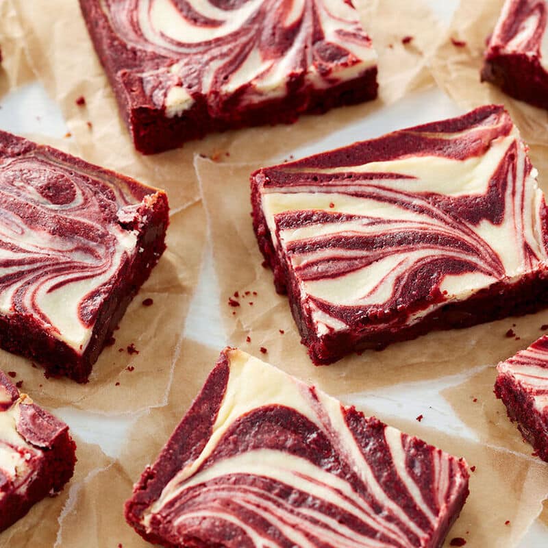 red-velvet-cheesecake-brownies classic cheesecake topped with berries