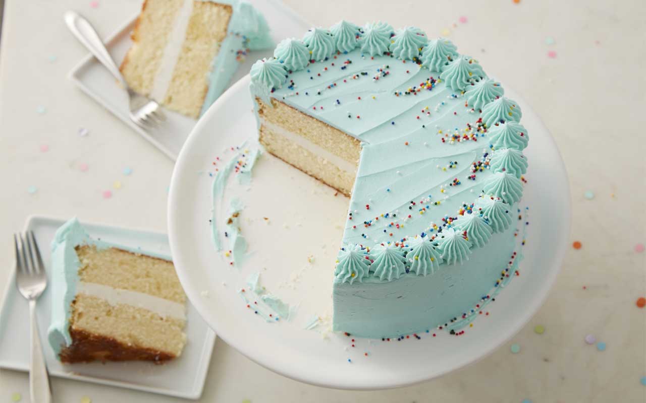 yellow-cake-with-blue-frosting basic two tiered yellow cake